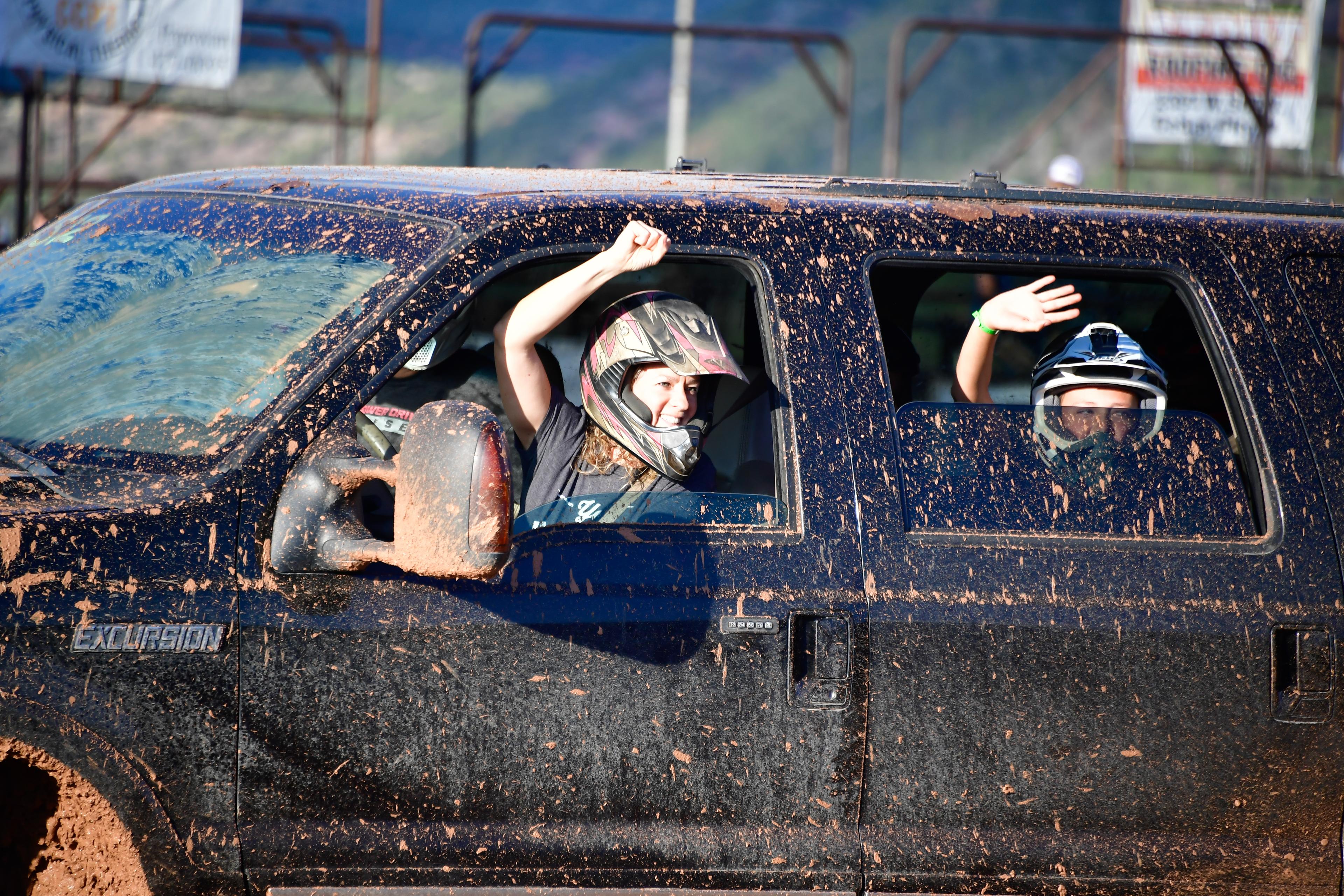 girls cheering after their truck made it