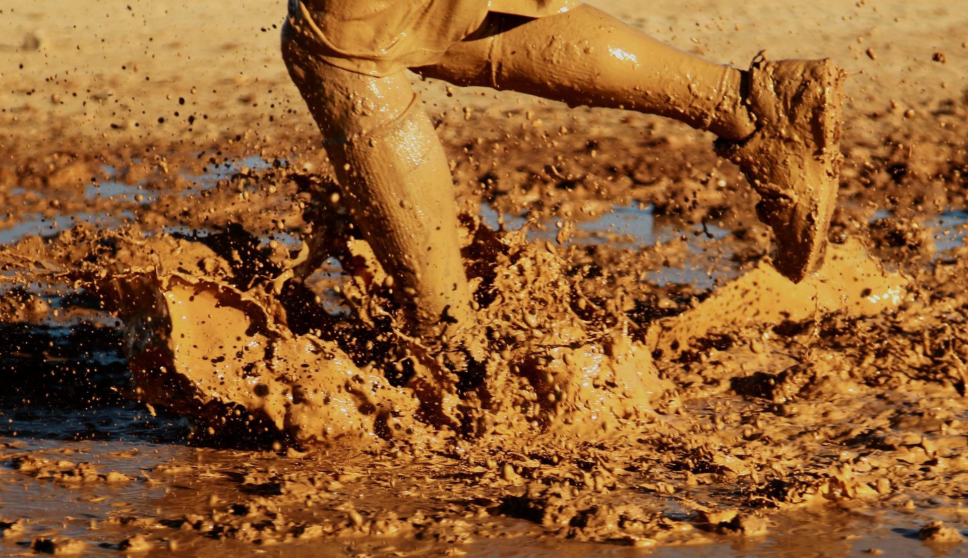 Feet running through the mud